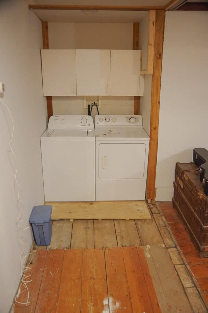 Washer and Dryer with cabinet above them