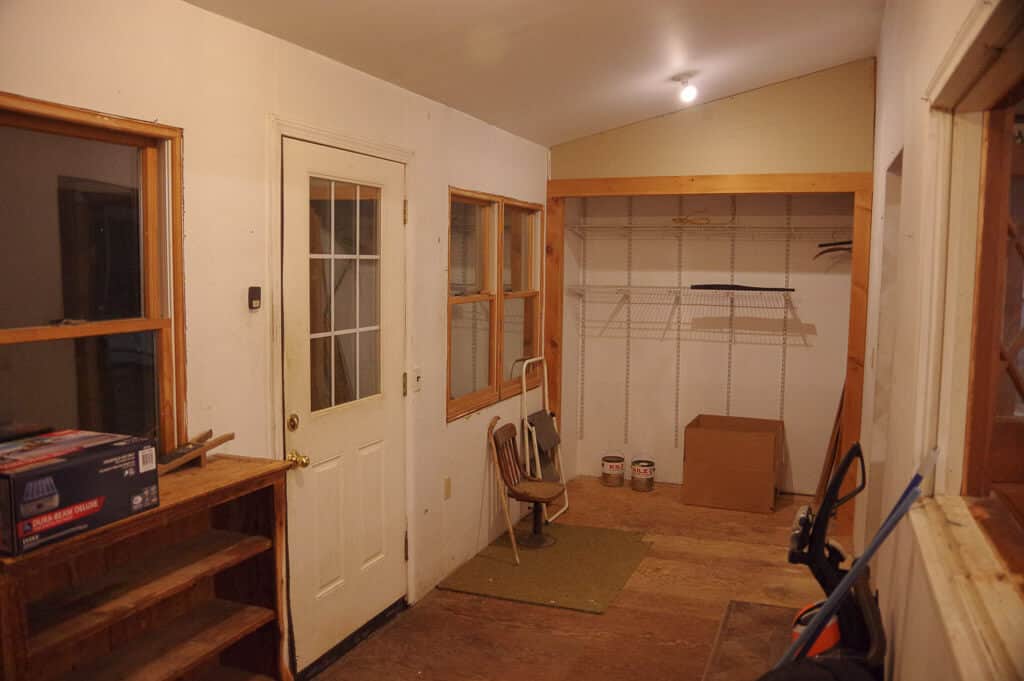 Picture of room with door, windows and closet