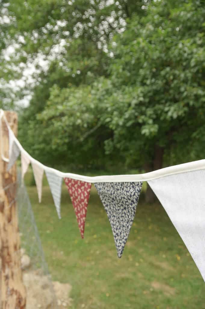 Banner hanging in front of a tree