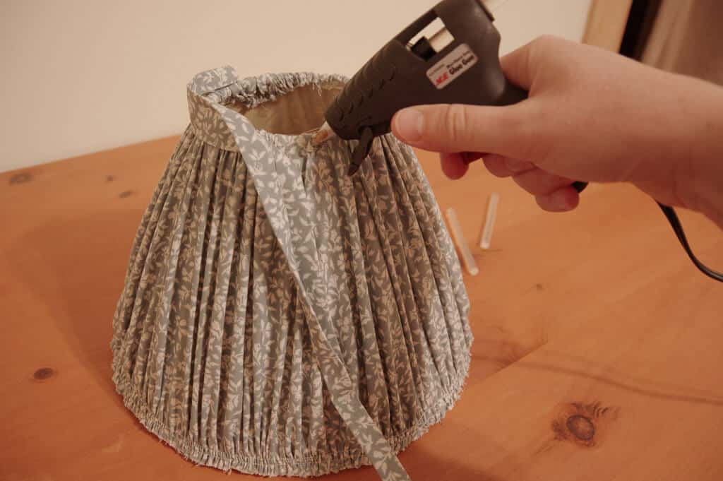 Hand hot gluing fabric together