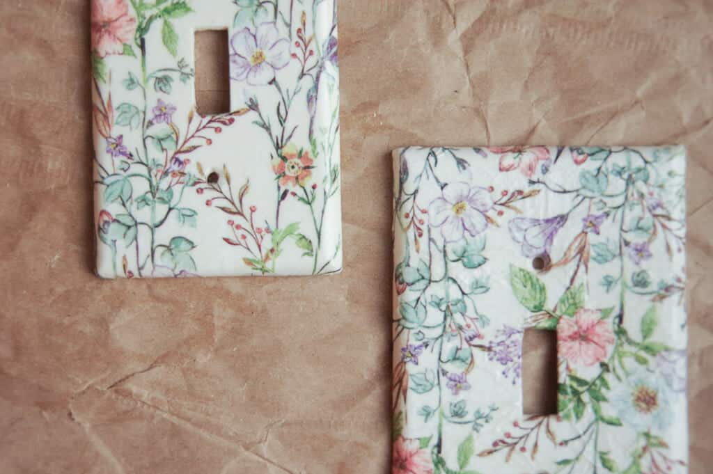 Two light switch covers on brown paper bag